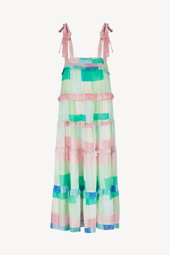 The Emely Dress in pink blue and green pastel check. This easy-fitting tiered dress features ruffles and and tie straps 