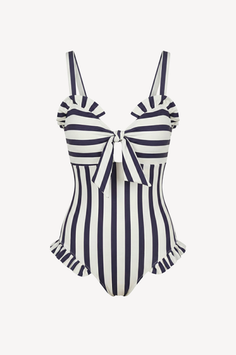 Navy and white striped swimsuit with a bow detail on a white background
