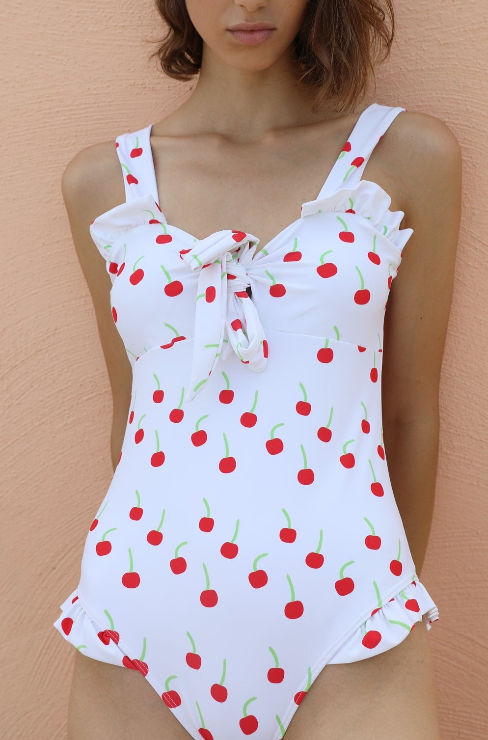 Maldives swimsuit in cherry print on a white background 